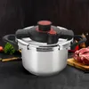 A pressure cooker is shown in a kitchen setting with raw meat and vegetables in the background. Podgląd zdjęcia produktu
