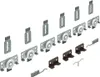A collection of sliding door hardware components laid out on a white background. Produktbild-Vorschau
