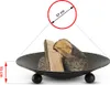 A fire pit with logs inside, with a diagram showing its dimensions. Anteprima dell’immagine prodotto