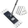 A mop head with a telescopic handle and a folded microfiber cloth. Produktbild-Vorschau