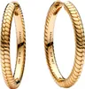 A pair of gold hoop earrings with a snake-skin pattern. Produktbild-Vorschau