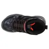 A top-down view of a black and red sneaker. Náhľad obrázku produktu