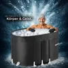 A man is sitting in an ice bath with ice cubes, surrounded by a frosty, icy background. Náhled obrázku produktu