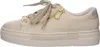 A side view of a beige sneaker with gold zipper detail. Náhled obrázku produktu