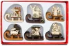 A set of six wooden Christmas tree ornaments in the shape of sleds, each carrying a different festive figure. Náhľad obrázku produktu