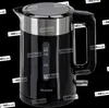 A black electric kettle with a silver band around the top and a silver handle, shown against a black background. Water level indicators are visible on the side. Produktbild-Vorschau