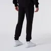 Pantaloni della tuta New Era Jogger - ESSENTIAL nero - S Anteprima dell’immagine prodotto 3