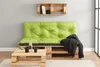 A living room scene with a pallet sofa and coffee table. Voir les images du produit