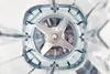 A close-up, top-down view of the blades inside a blender. Podgląd zdjęcia produktu