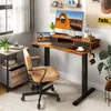 A home office setup with a standing desk, computer, laptop, and chair. Produktbild-Vorschau