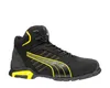 A black and yellow Puma safety boot is shown against a white background. Voir les images du produit