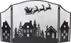 A black metal fireplace screen with a Christmas scene silhouette. Produktbild-Vorschau