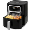 A black air fryer with a basket full of french fries and chicken wings, with steam rising from the basket. The air fryer has a digital display showing the temperature. Produktbild-Vorschau