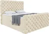 A tufted beige boxspring bed with a mattress and topper, shown from a diagonal angle against a white background. Produktbild-Vorschau