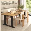 A dining table and chairs set in a modern kitchen setting. Voir les images du produit