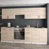 A modern kitchen setup with light wood cabinets, a black countertop, and stainless steel appliances. Produktbild-Vorschau