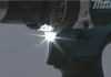 Close-up of a power drill with its LED light on. Produktbild-Vorschau