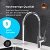 A close-up of a kitchen faucet with water running, with marketing text and logos overlaid. Produktbild-Vorschau