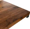 A close-up view of a wooden table with a black leg and the brand name 'di volio' etched on the side. Produktbild-Vorschau