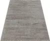 A shaggy rug is shown from a slightly elevated angle against a white background. Anteprima dell’immagine prodotto