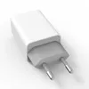 A white and gray USB charger with two prongs for an electrical outlet. Produktbild-Vorschau
