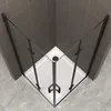 A corner shower enclosure with black frames and clear glass panels, set against tiled walls and a tiled floor. Produktbild-Vorschau