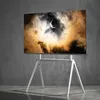 A TV stand with a TV displaying a solar eclipse. Produktbild-Vorschau