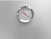 A close-up shot of a thermometer on a metallic surface. Náhľad obrázku produktu