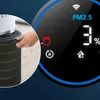 A close-up of an air purifier filter being inserted into the unit, with a digital display showing air quality information. Podgląd zdjęcia produktu