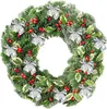 A Christmas wreath decorated with bows and berries. Náhľad obrázku produktu