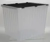 A clear, studio shot of a large, transparent plastic storage box with a black lid. Produktbild-Vorschau