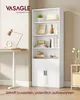 A white bookshelf filled with books and decorative items, next to a desk with a lamp and clock. Produktbild-Vorschau