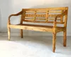 A wooden bench is shown against a light-colored wall and floor. Produktbild-Vorschau