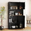 A black kitchen cabinet with various items stored inside, including a coffee machine, jars, books, and cookware. A plant is visible to the left. Náhľad obrázku produktu