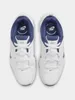 Top-down view of a pair of white Nike sneakers with blue accents. Voir les images du produit