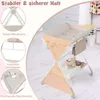 A baby changing table with storage and accessories, shown in a room setting with a dresser and curtains in the background. Produktbild-Vorschau