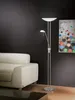 A modern living room with a white sofa and a floor lamp. Produktbild-Vorschau