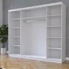 A white wardrobe with shelves and a hanging rail, set against a grey concrete wall and a wooden floor. Produktbild-Vorschau