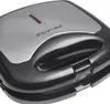 A close-up shot of a closed sandwich maker. Anteprima dell’immagine prodotto