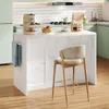 A modern kitchen scene featuring a kitchen island with a coffee maker, pancakes, and a stool. Náhled obrázku produktu