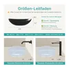 A diagram showing the dimensions of a black ceramic sink, with two examples of faucet installations. Produktbild-Vorschau