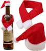 Christmas-themed bottle accessories including a hat and scarf, with one set on a wine bottle. Náhled obrázku produktu