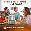 A family enjoying a fondue meal together. Voir les images du produit