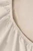 A close-up view of a fitted sheet with elastic edging. Produktbild-Vorschau
