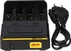 A black and yellow battery charger with a power cord and plug. Produktbild-Vorschau