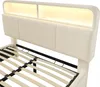 A close-up view of a bed frame with a headboard featuring integrated LED lighting and a slatted base. Náhled obrázku produktu