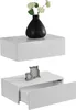 Two white floating shelves are displayed against a white background. The top shelf has a black vase with white flowers. The bottom shelf has a drawer partially open and two small decorative picture frames. Voir les images du produit