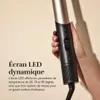 A hand holding a hair styling tool with an LED display. Produktbild-Vorschau