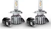 Two car headlights and their connectors are displayed against a white background. Produktbild-Vorschau