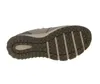 The underside of a shoe is shown against a white background. Voir les images du produit